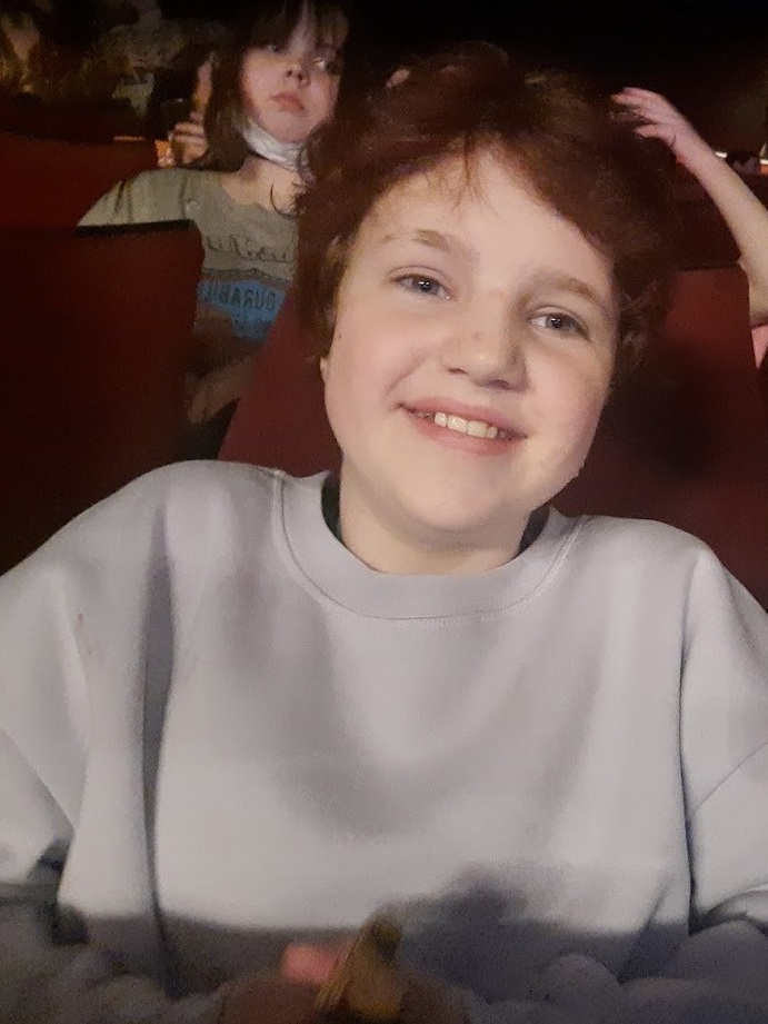 Maeve attending girl in red at the 3Olympia Theatre